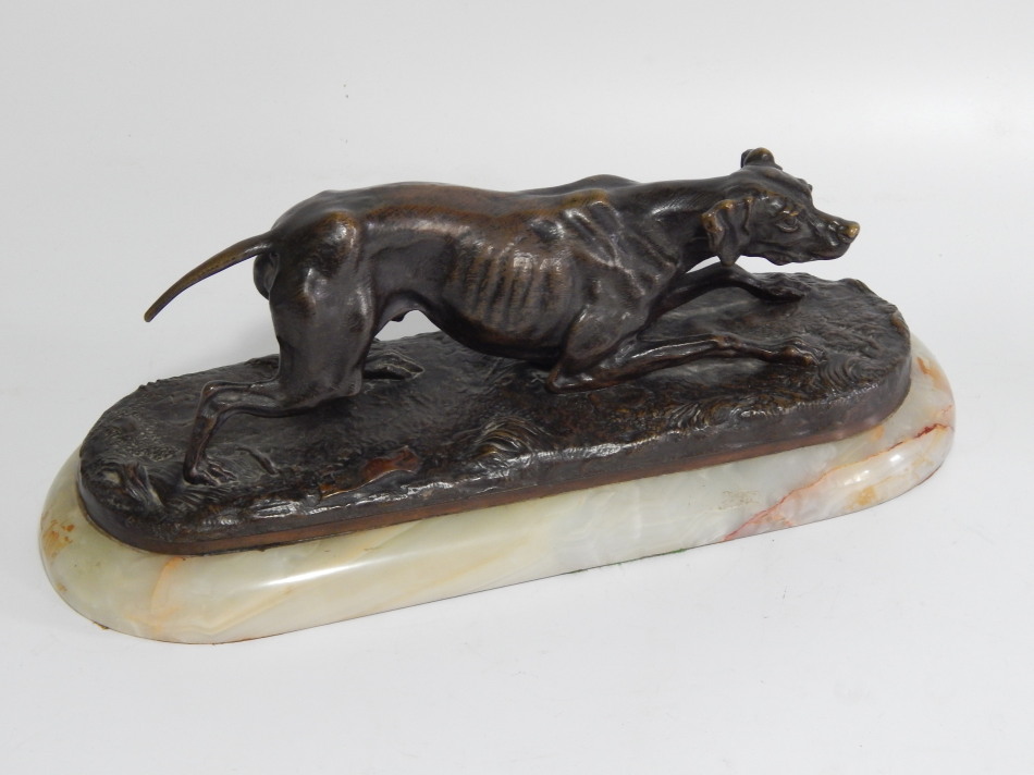 Appraisal: A thC French bronze model of a pointer indistinctly signed