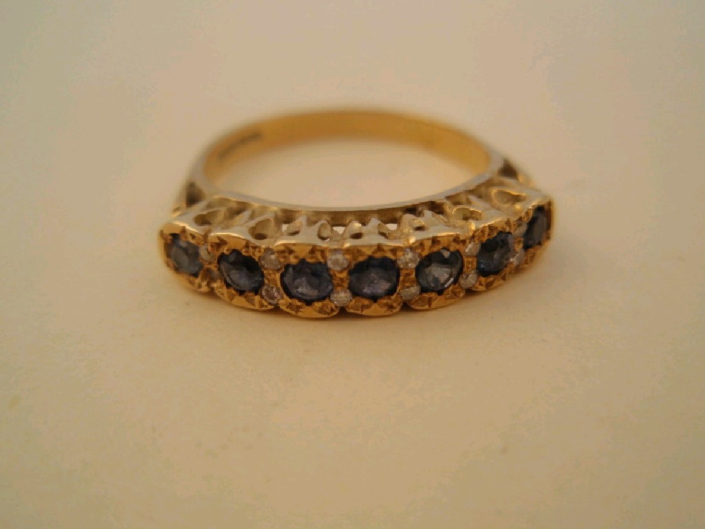 Appraisal: An ct gold seven stone in-line set ring pale blue