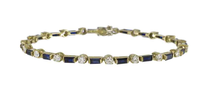 Appraisal: K DIAMOND SAPPHIRE BRACELET In the original Bergdorf Goodman box