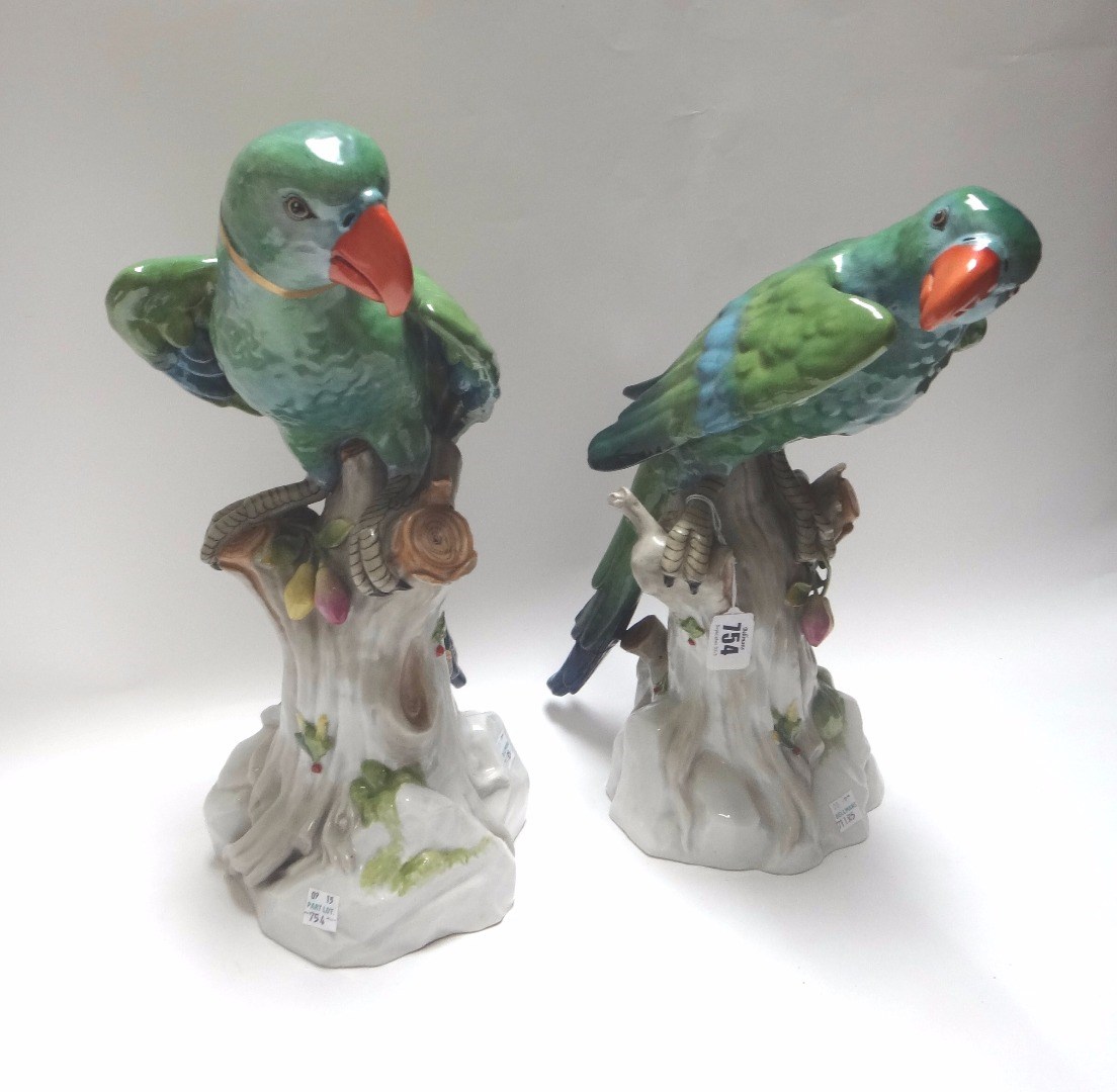 Appraisal: A pair of large German porcelain parrots th century each