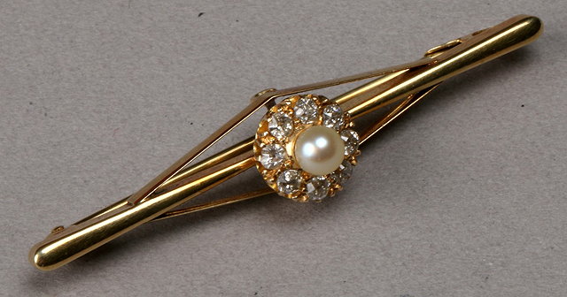 Appraisal: A PEARL AND DIAMOND SET BAR BROOCH in the form