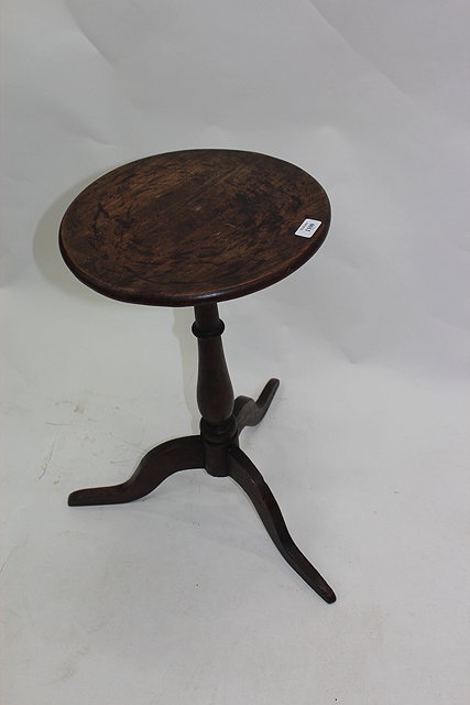 Appraisal: AN ANTIQUE OAK WINE TABLE with circular top turned column