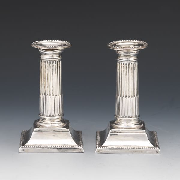 Appraisal: ENGLISH VICTORIAN PAIR OF STERLING NEOSLASSICAL CANDLESTICKS BY HARRISON BROS