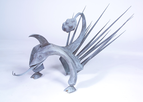 Appraisal: SCULPTURE Outdoor metal sculpture of a reptilian creature with spikes