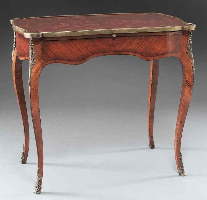 Appraisal: French parquetry inlaid bronze mounted writingtable the kidney shaped top