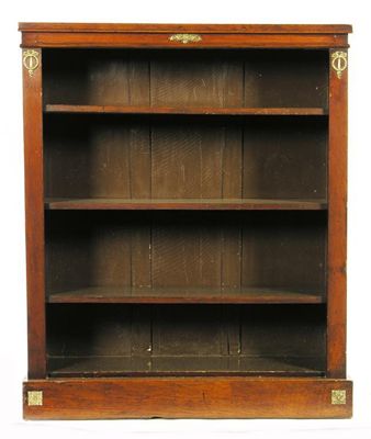 Appraisal: A Victorian walnut open bookcase with applied gilt brass mounts