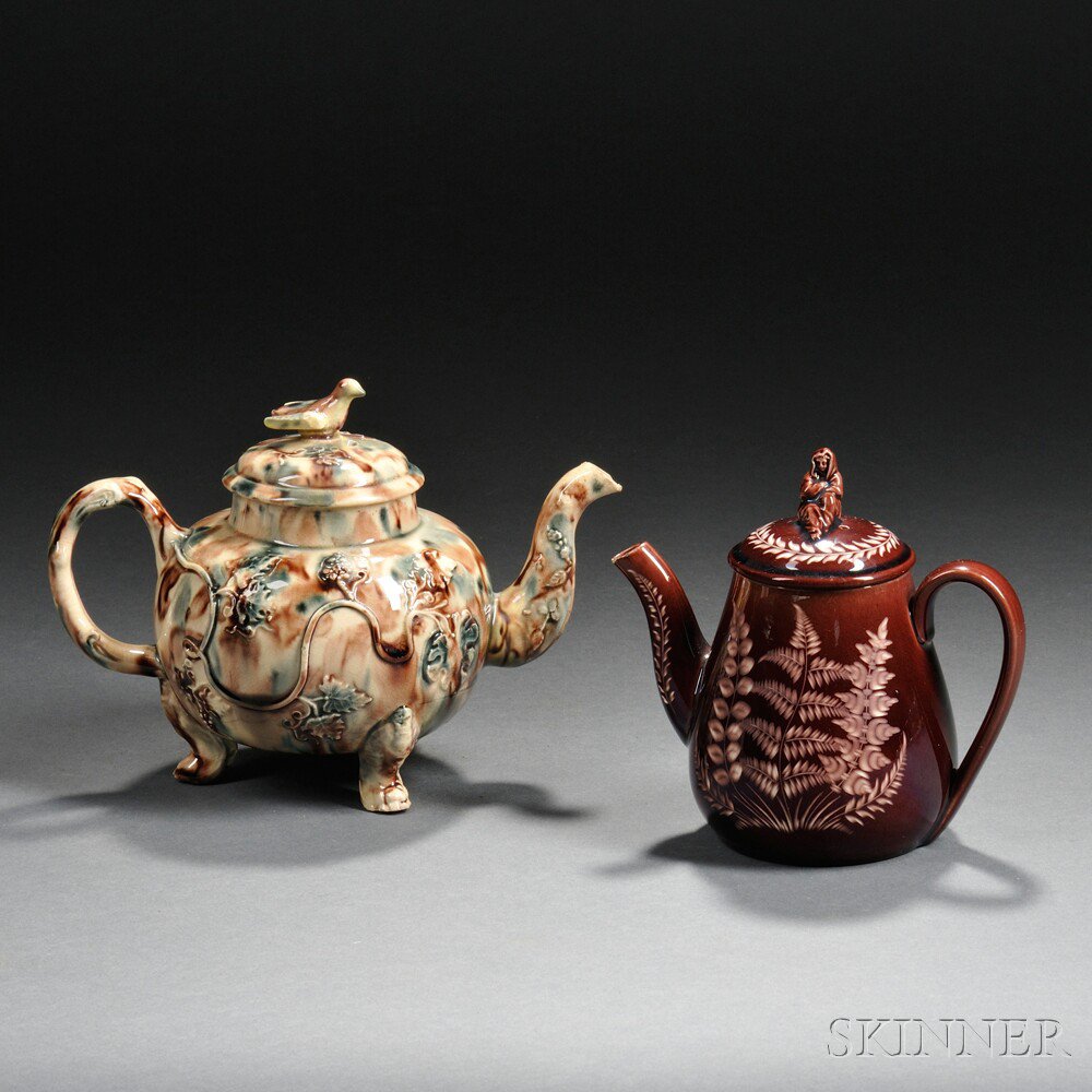 Appraisal: Staffordshire Earthenware Footed Teapot and a Wedgwood Vigornian Teapot th