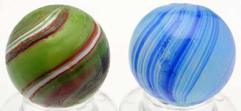 Appraisal: Lot of Handmade Banded Swirl Marbles Includes one semi-transparent white