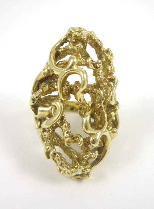 Appraisal: FOURTEEN KARAT GOLD RING custom crafted in a contemporary freeform