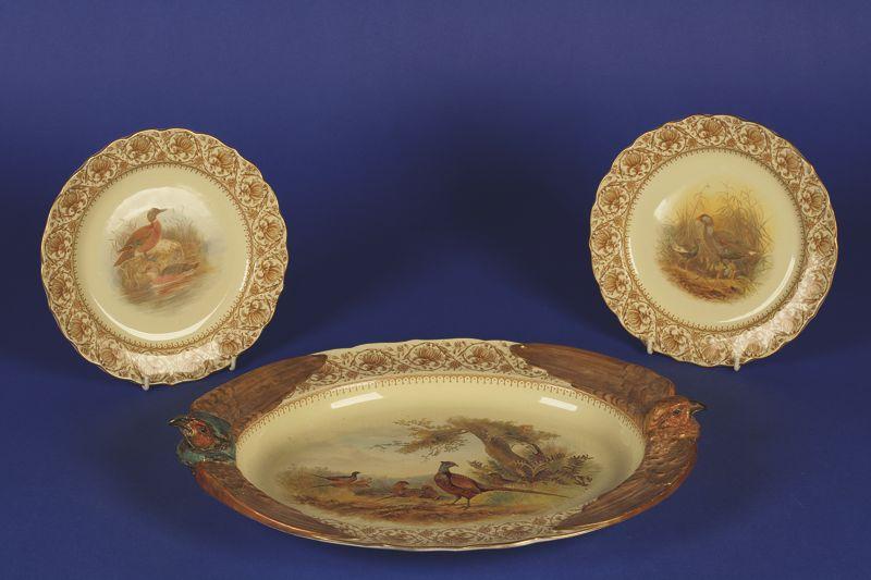 Appraisal: A ROYAL WORCESTER VITREOUS CHINA GAME SERVICE comprising oval serving