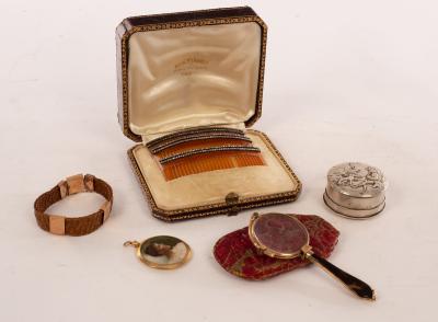 Appraisal: A set of three hair combs each decorated with two