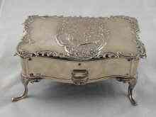 Appraisal: A large trinket box with pull out lined hardwood drawer