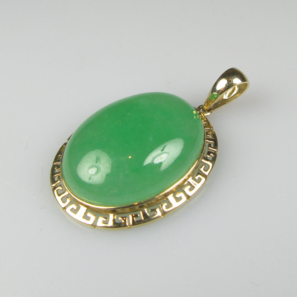 Appraisal: k Yellow Gold Pendant set with an oval jadeite cabochon