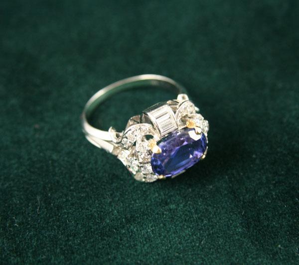 Appraisal: A Sapphire and Diamond Cluster Ring the oval shaped sapphire