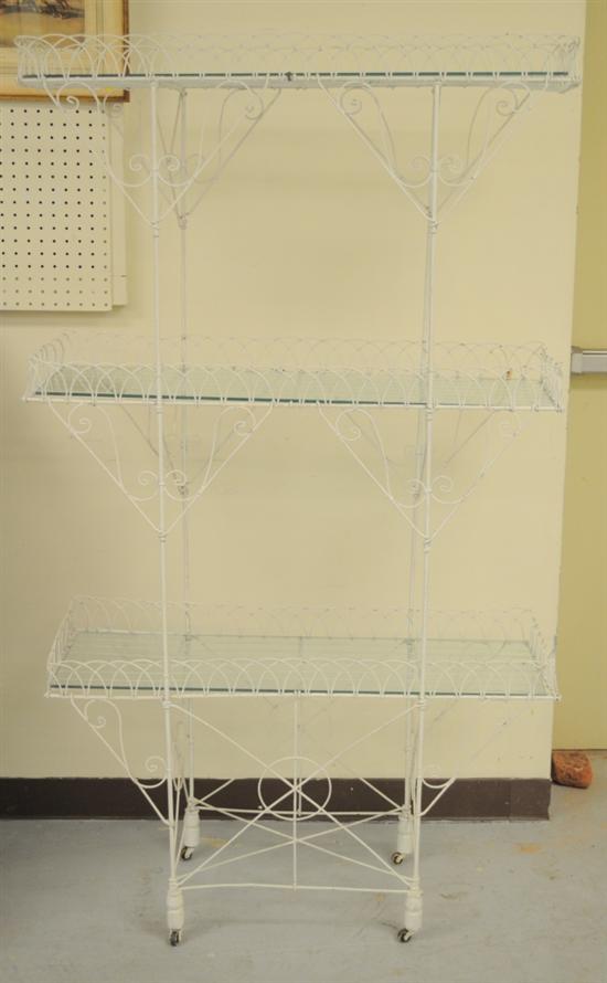 Appraisal: Three tier painted white wire plant stand with glass shelves