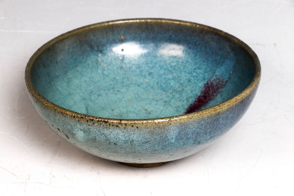 Appraisal: A LARGE JUN PURPLE SPLASHED BOWL superbly potted with deep