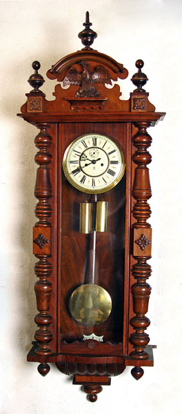 Appraisal: GUSTAV BECKER CARVED EAGLE WALNUT WALL CLOCK Marked GB with