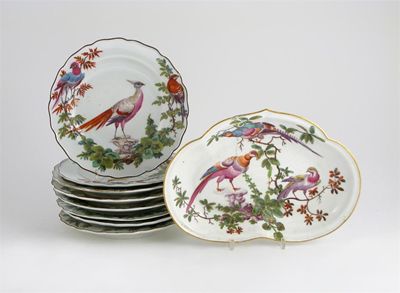 Appraisal: Nine Chelsea plates and dishes boldly painted with large exotic