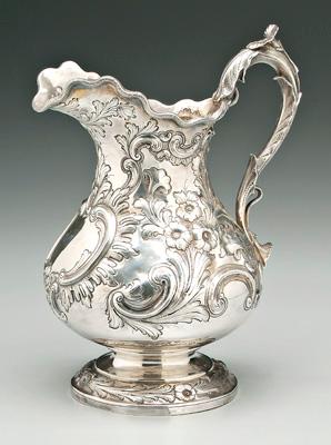 Appraisal: Coin silver water pitcher baluster form body scroll handle with