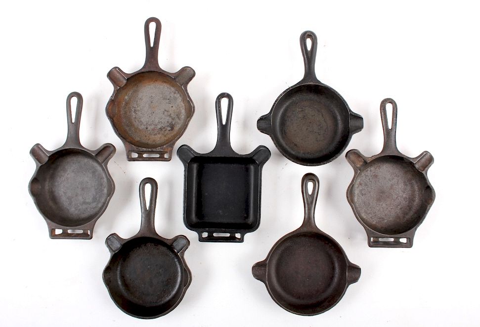 Appraisal: Collection Of Griswold Wagner Cast Iron Ashtrays For your consideration