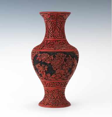 Appraisal: A Carved Cinnabar Vase Baluster form carved cinnabar vase