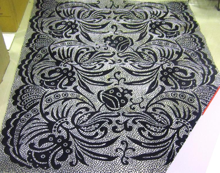 Appraisal: A WOOLLEN FLOOR RUG X CM NEW ZEALAND WOOL 'BLACK