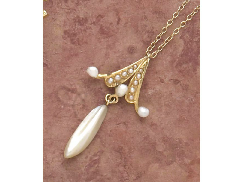 Appraisal: ART NOUVEAU FRESHWATER PEARL PENDANT k yellow gold triangular pendant