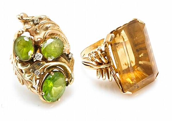 Appraisal: A citrine and k gold ring together with a peridot