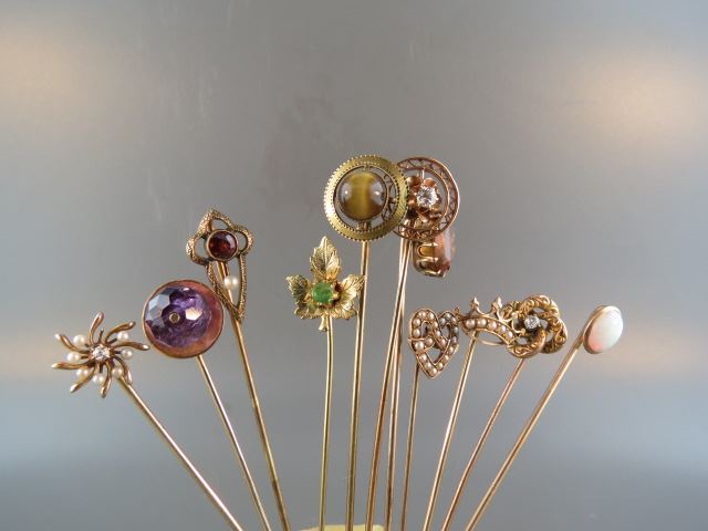 Appraisal: Collection of Gold Stickpins mostly Victorian with diamonds emerald opal