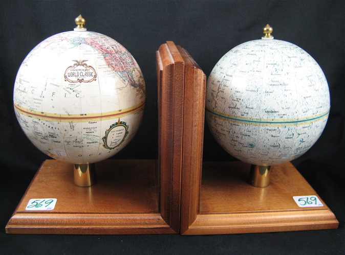 Appraisal: PAIR OF WORLD GLOBE BOOKENDS one globe in color showing