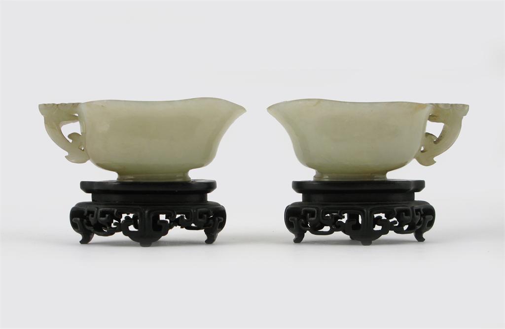 Appraisal: A small pair of Chinese jade libation cups