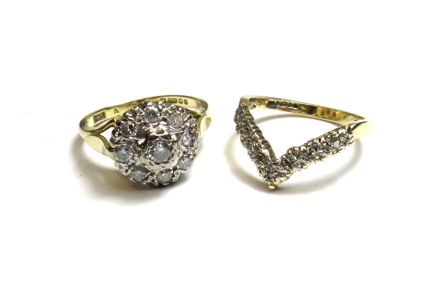 Appraisal: An ct gold and diamond set nine stone cluster ring