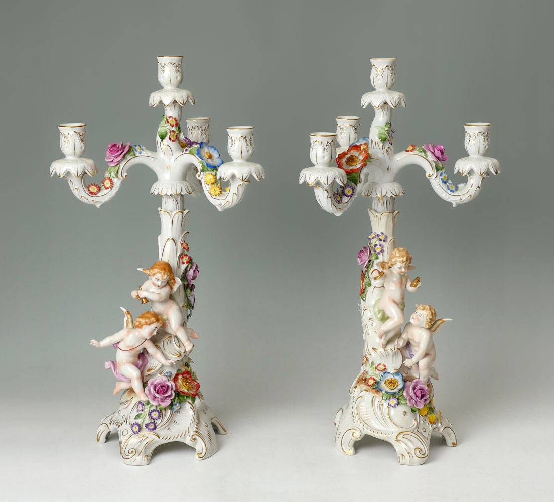 Appraisal: PAIR OF GERMAN SCHIERHOLZ FIGURAL PORCELAIN CANDLESTICKS German Schierholz porcelain