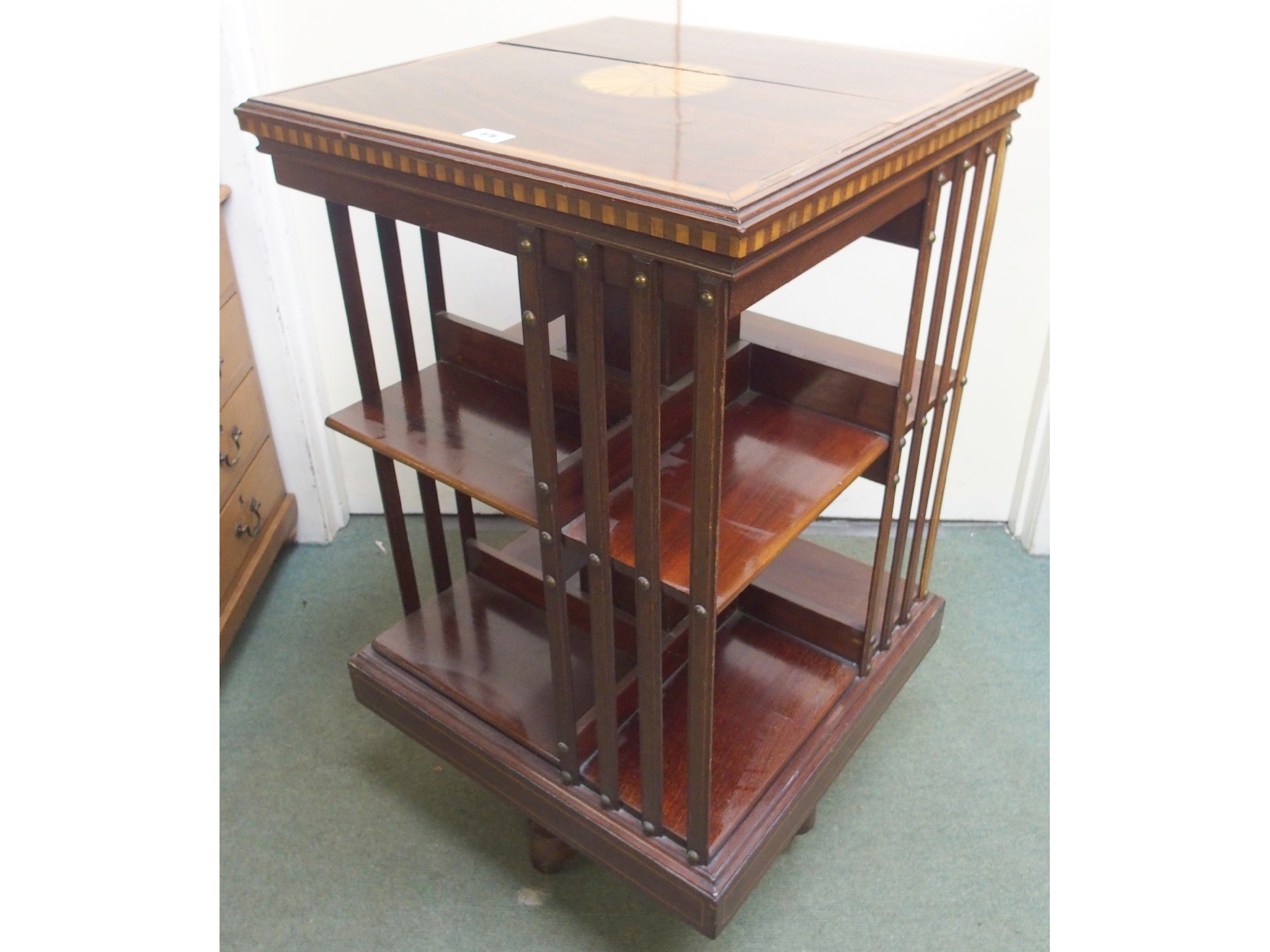 Appraisal: An Edwardian mahogany inlaid revolving bookcase