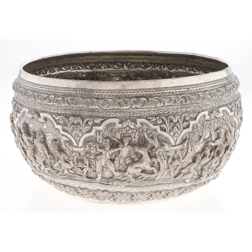 Appraisal: A Burmese silver repousse bowl c with jataka scenes maker's