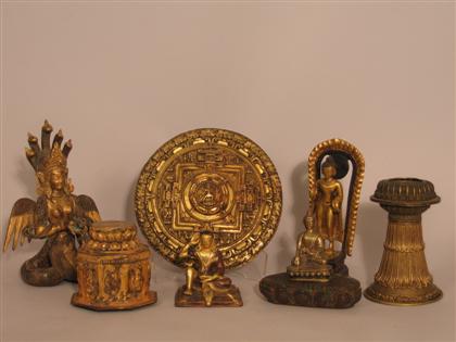 Appraisal: Eight gilt-metal Sino Tibetan table items th century and later