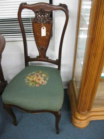 Appraisal: Victorian Carved Inlaid Side Chair floral needlepoint seat mother of