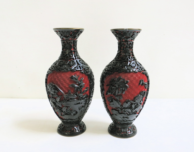 Appraisal: PAIR OF CHINESE CINNABAR STYLE VASES in baluster form and