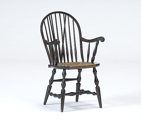 Appraisal: WINDSOR BRACEBACK ARMCHAIR with woven seat and scroll arms ht