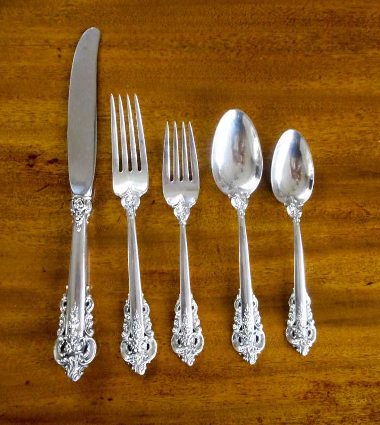 Appraisal: WALLACE GRAND BAROQUE STERLING SILVER FLATWARE SET sixty-one pieces comprised