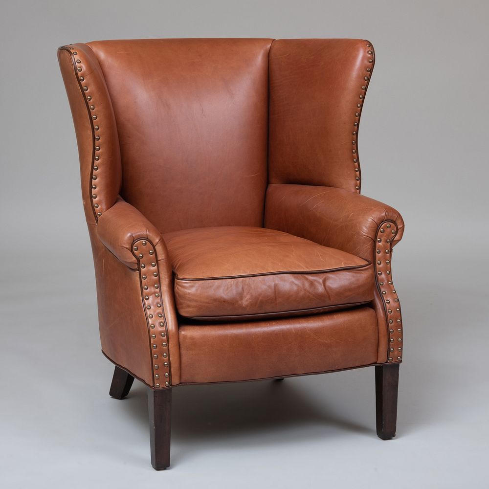 Appraisal: Cisco Brothers Brass-Studded Leather Wing Chair of Recent Manufacture With