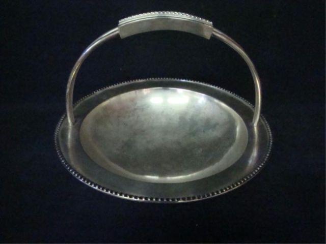 Appraisal: Portuguese Silver Footed Bowl with Handle Stamped with Portuguese eagle