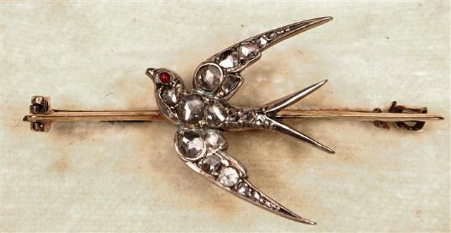 Appraisal: A VICTORIAN DIAMOND SET SWALLOW BROOCH body and wings set