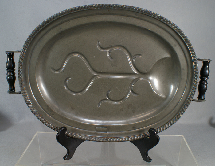 Appraisal: Pewter tree and well warming platter wooden feet and handles