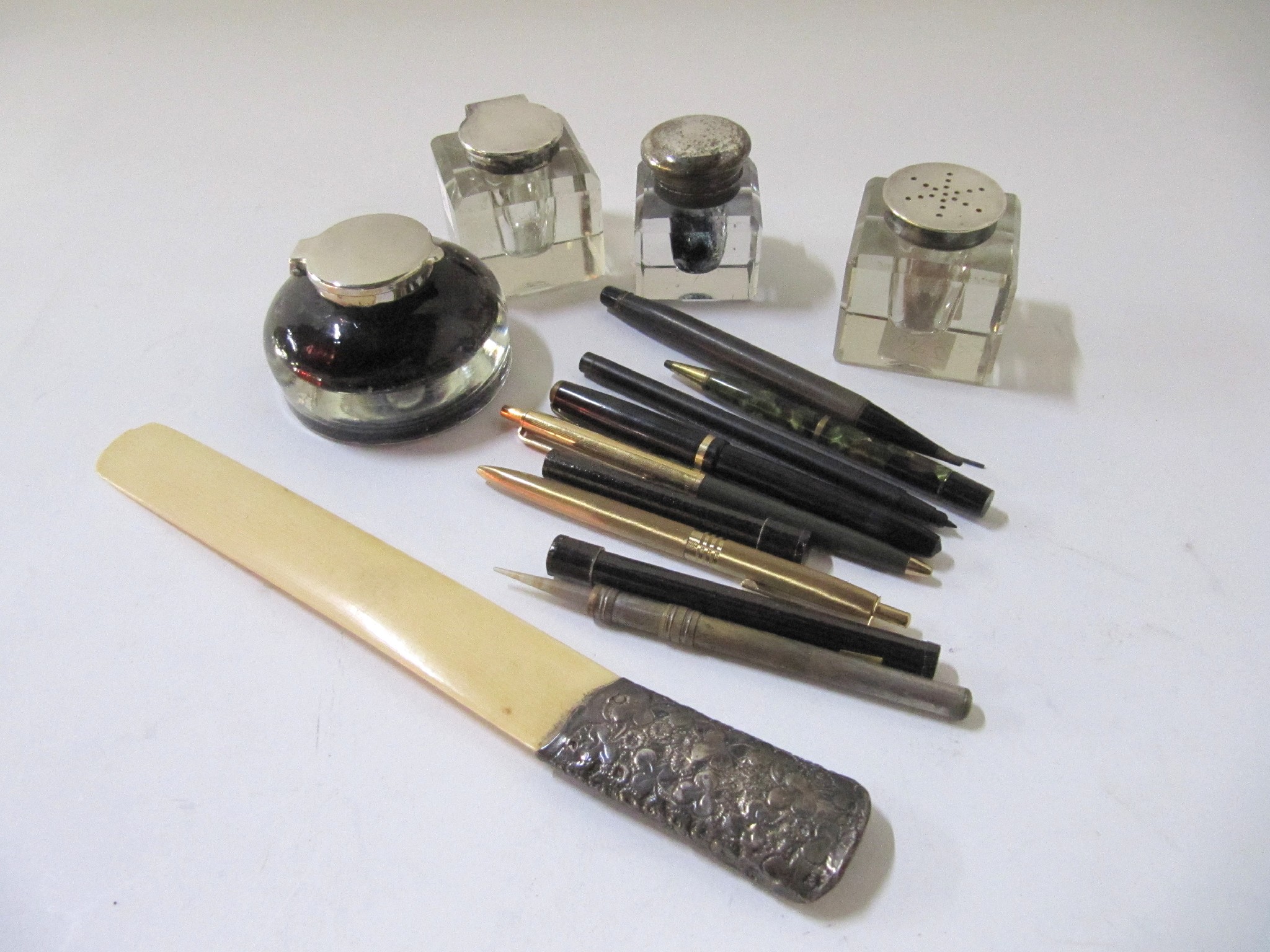 Appraisal: A collection of various pens four white-metal mounted ink wells