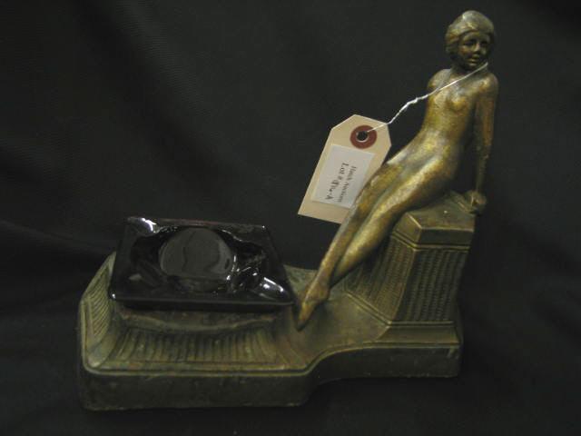 Appraisal: Art Deco Figural Bronzed Ashtray red insert nude at rest