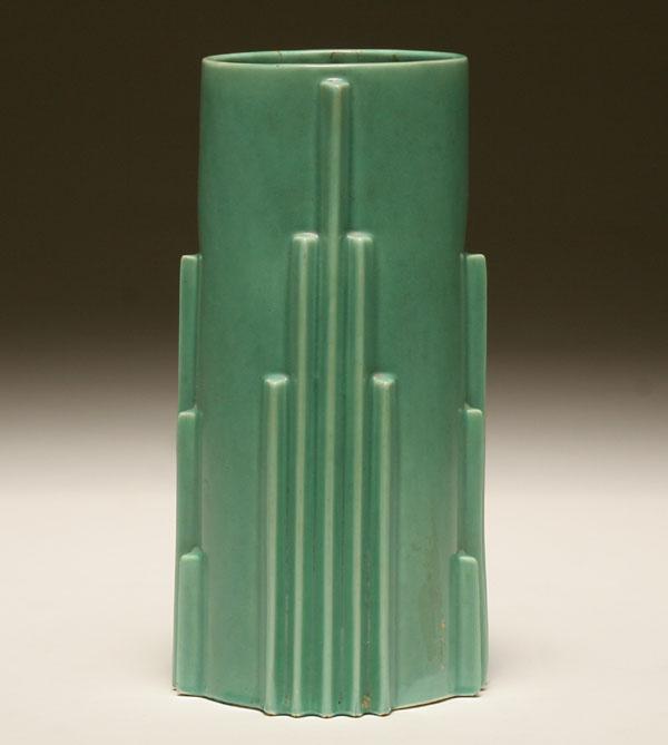 Appraisal: Deco art pottery vase in matte green with stylized skyscraper