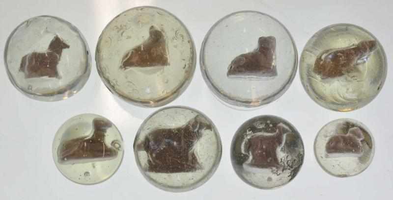 Appraisal: Lot of Dog Sulphide Marbles Condition - Size Range to