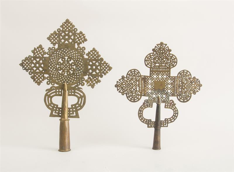 Appraisal: TWO ETHIOPIAN COPTIC GILT-METAL CROSS STANDARDS Each with pierced interwoven