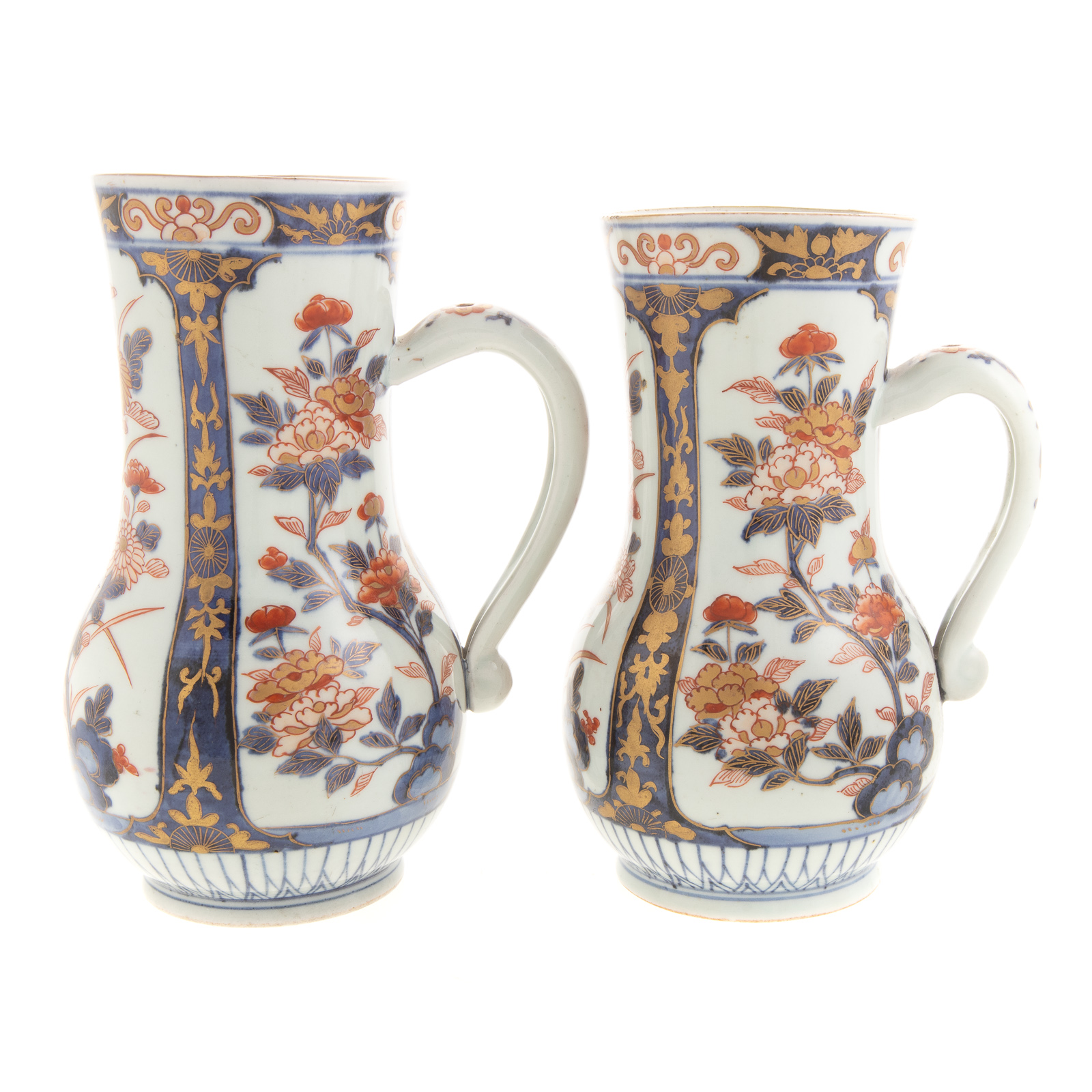 Appraisal: PAIR JAPANESE IMARI CIDER JUGS Late th early th century